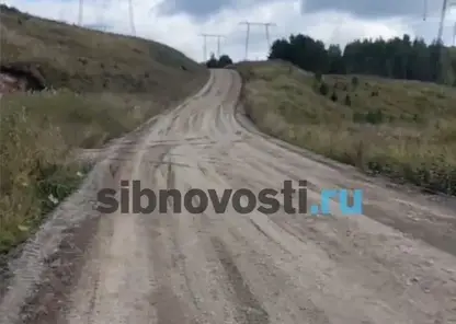 Размытую из-за дождей дорогу в СНТ под Красноярском отремонтировали