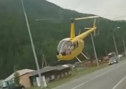 Новосибирец посадил вертолет на автозаправку в Алтае