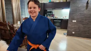 Красноярский школьник получил в подарок от Путина синее кимоно