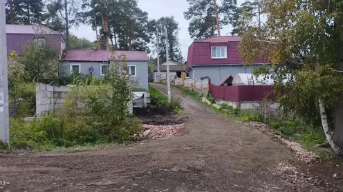 Разрушенный ливнем мост через ручей Лалетина восстановили в Красноярске