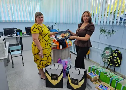 Волонтеры Богучанской ГЭС подарили школьникам «Чемодан добра»