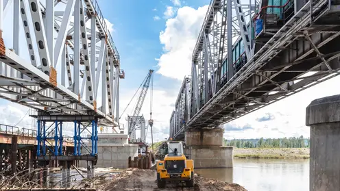 Начался монтаж последних пролетов нового железнодорожного моста через реку Бирюса на участке Красноярской железной дороги Запань – Тагул в Иркутской области