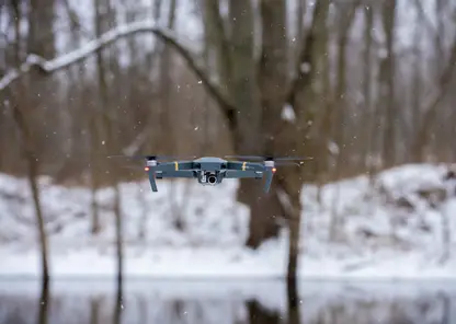 flying-black-drone-winter