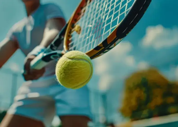 view-tennis-racket-hitting-ball_23-2151378486