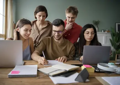 colleagues-using-laptops-notebooks-learning-study-session